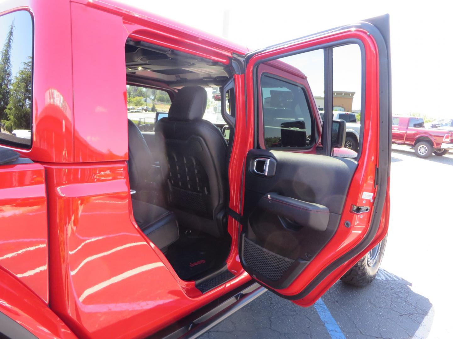 2020 Red /black Jeep Gladiator Rubicon (1C6JJTBG6LL) with an 3.6L V6 DOHC 24V engine, 6M transmission, located at 2630 Grass Valley Highway, Auburn, CA, 95603, (530) 508-5100, 38.937893, -121.095482 - Rubicon Gladiator featuring a Mopar suspension system with Fox shocks, 17" AEV wheels wrapped in 37" BFG tires, Warn Winch, Rock sliders, Cascade front license plate holder, Impact bedliner, Built Right Industries bed Molle panels, and Window tint. - Photo#54